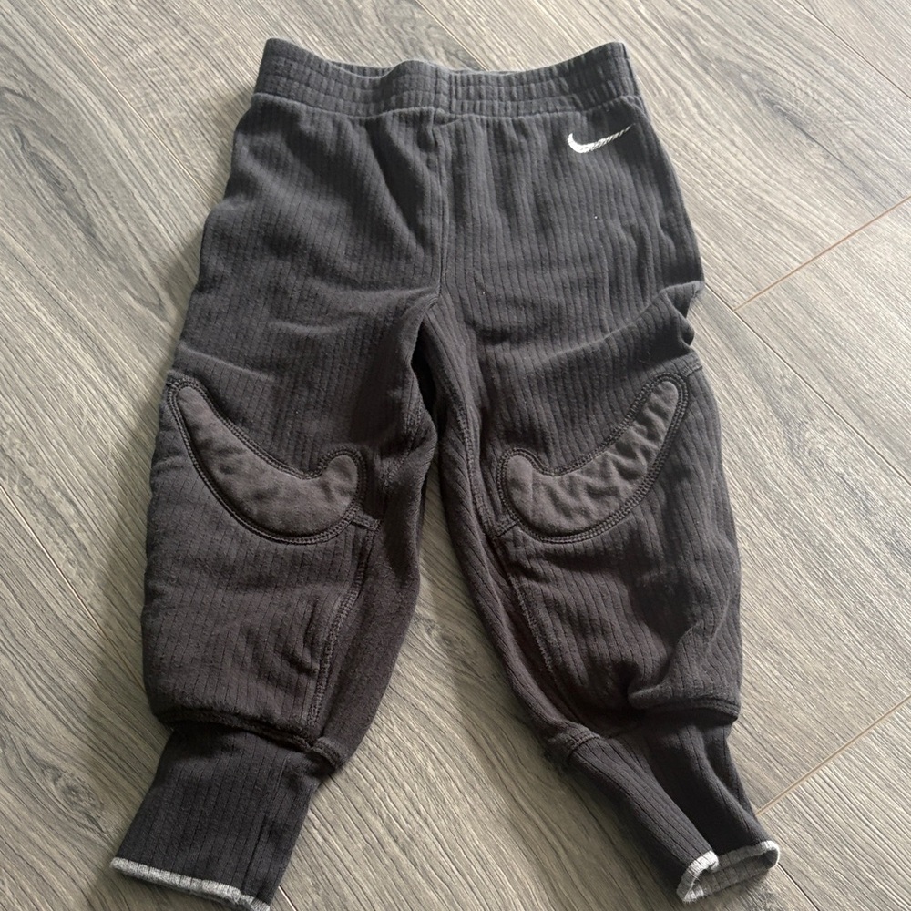 Nike Kids Black Padded Soccer Pants with White Swoosh